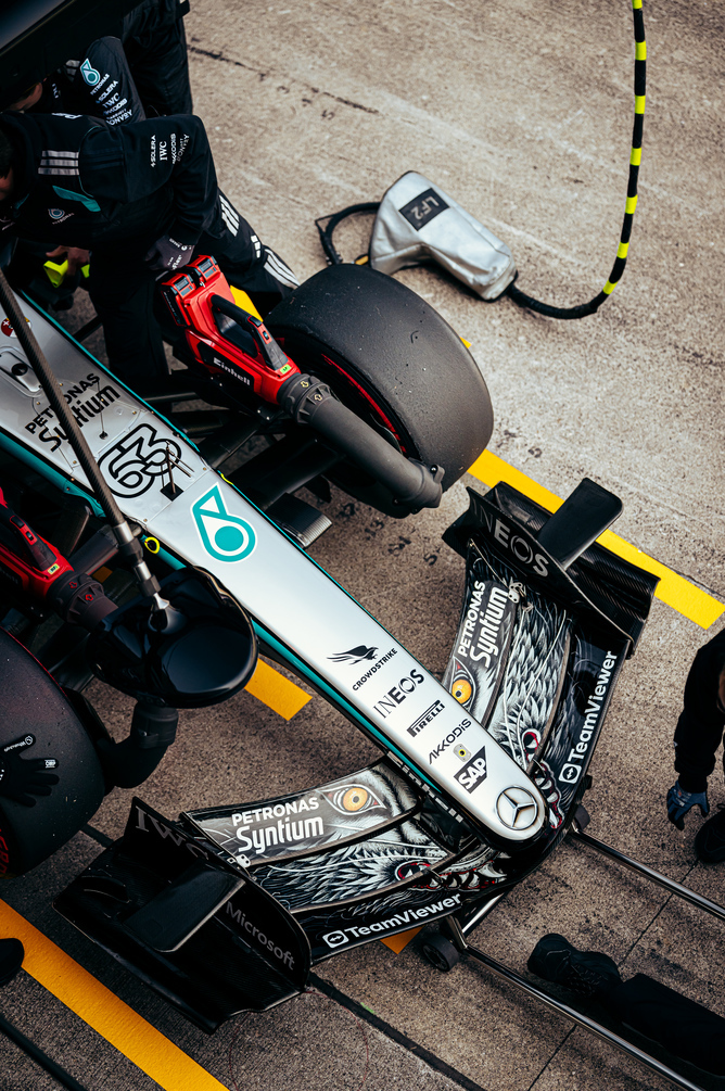 Overhead view of Mercedes F1 car in the garage